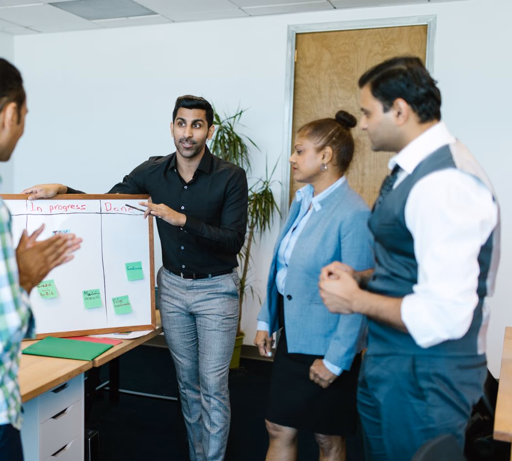 Indian middle-level manager working in a professional office